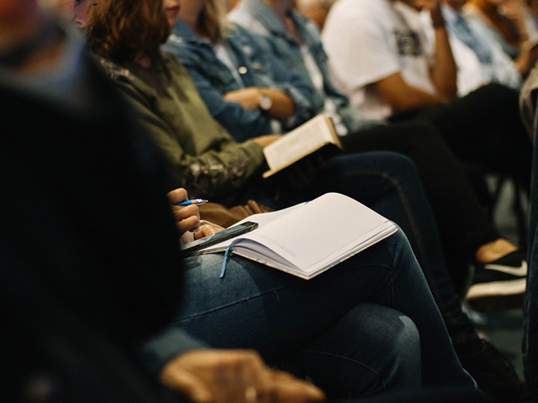 people attending a research seminar