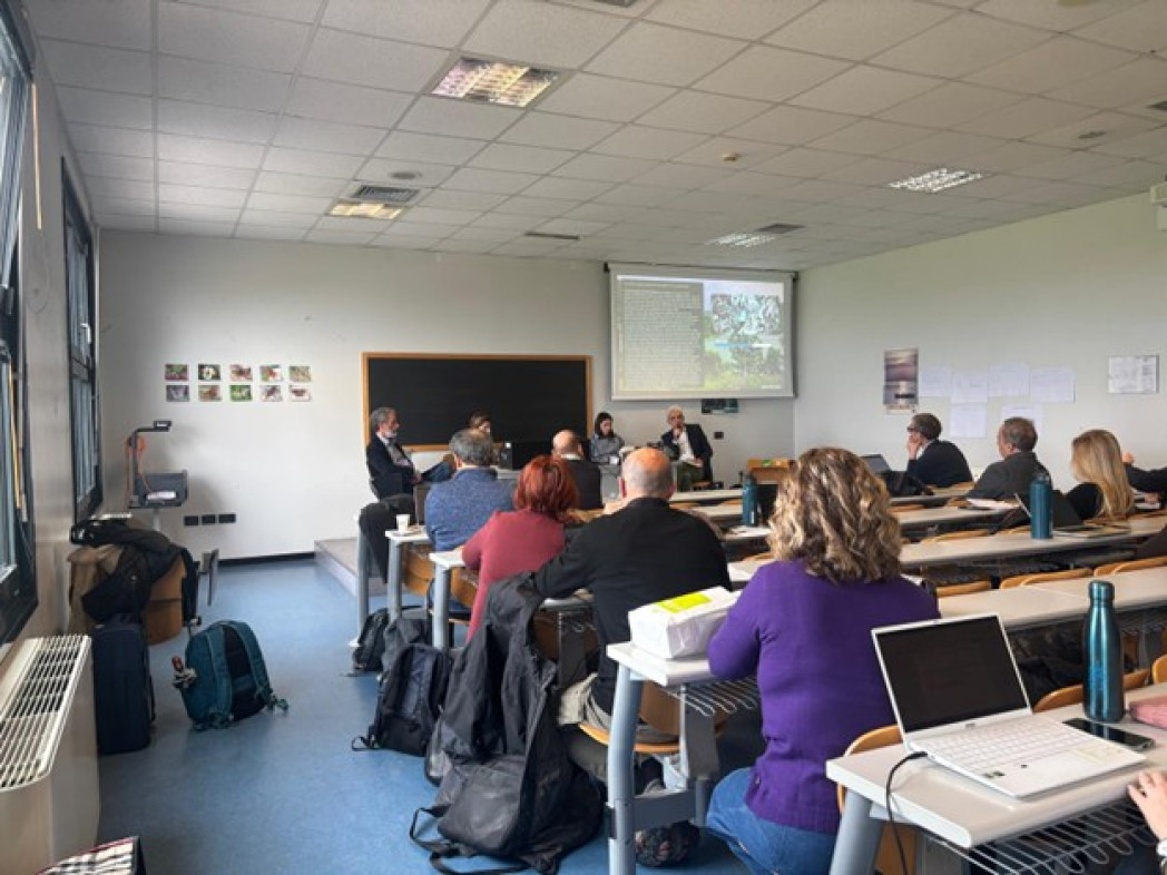 Participants listening to a presentation in a classroom