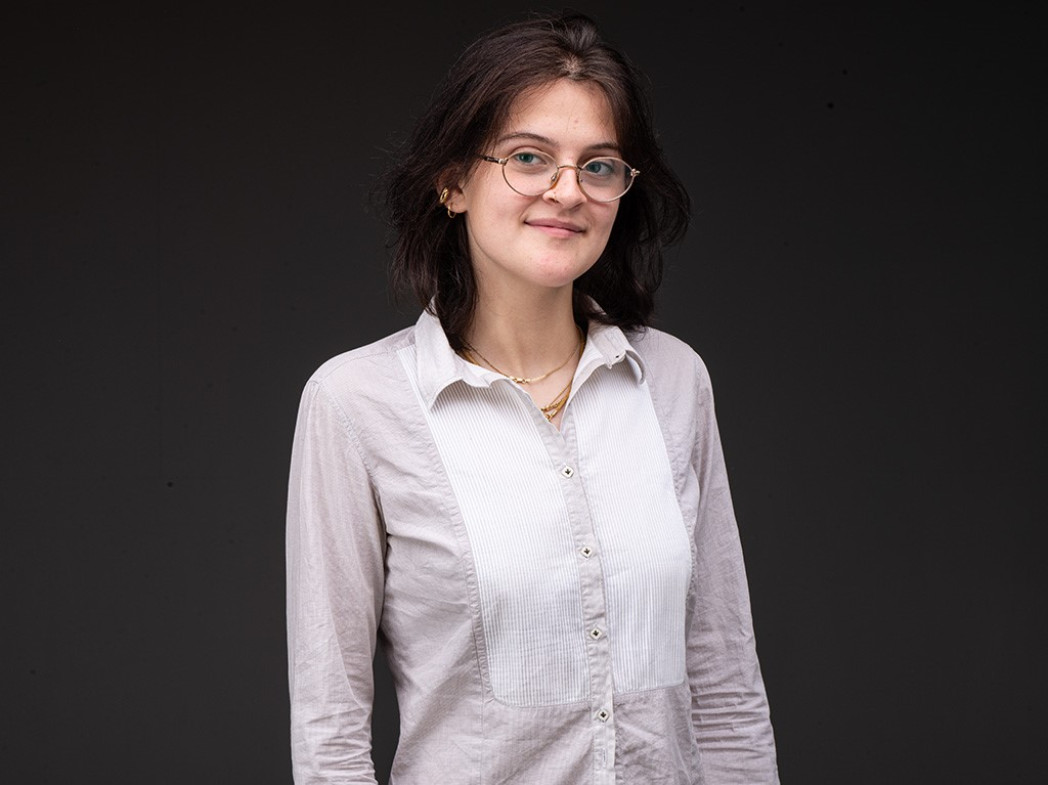 Half-length photographic portrait of a young woman.