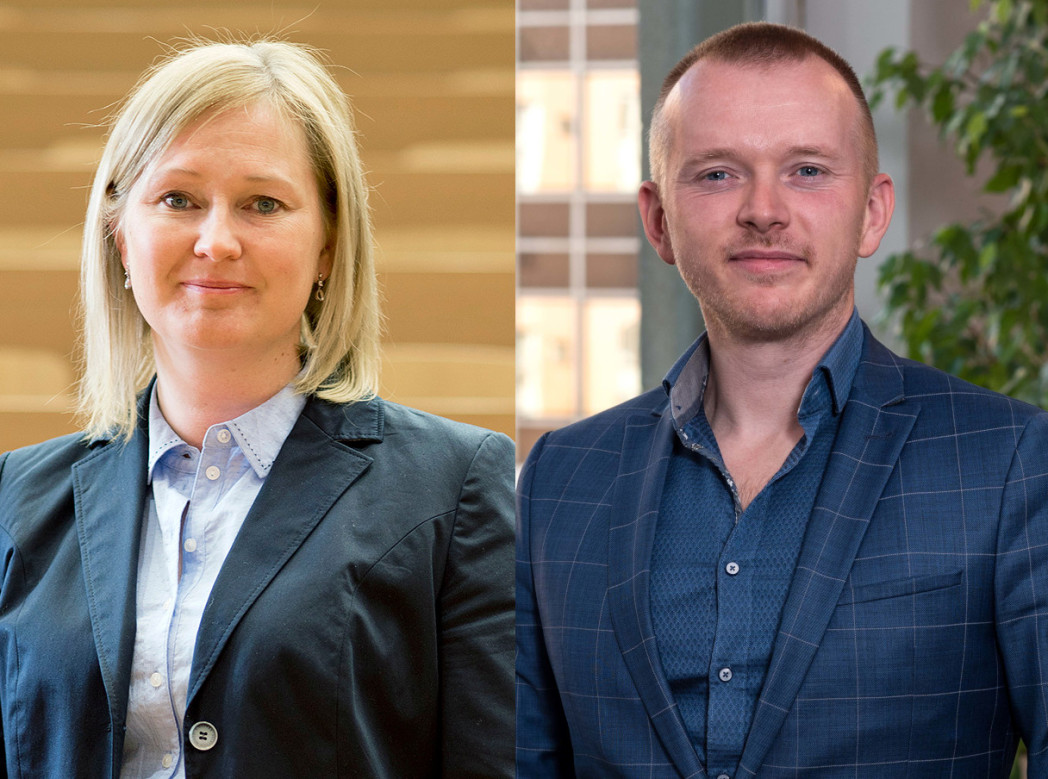 Frontales Porträt einer Frau und eines Mannes, in eleganter Kleidung.