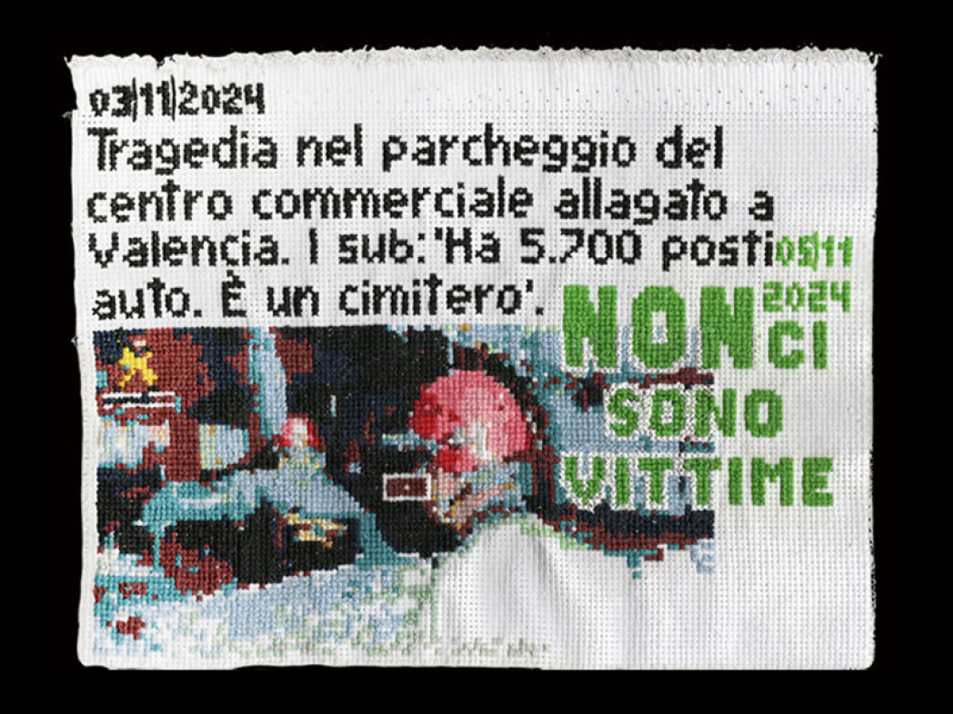 Gesticktes Bild einer Online-Nachricht auf Italienisch über ein überflutetes Parkhaus in Valencia vom 03.11.2024
