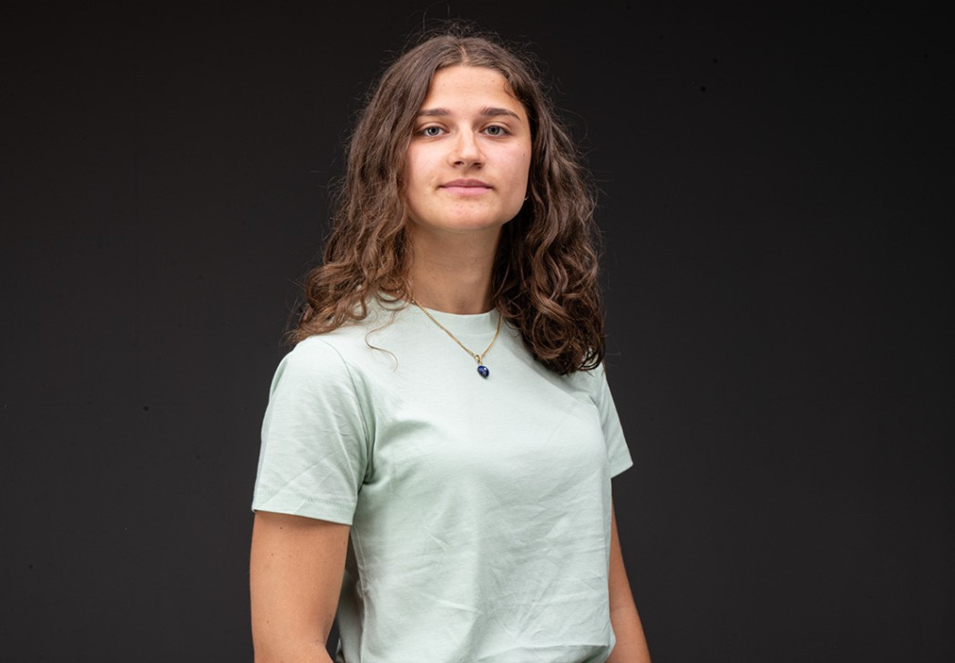 Half-length photographic portrait of a young woman.