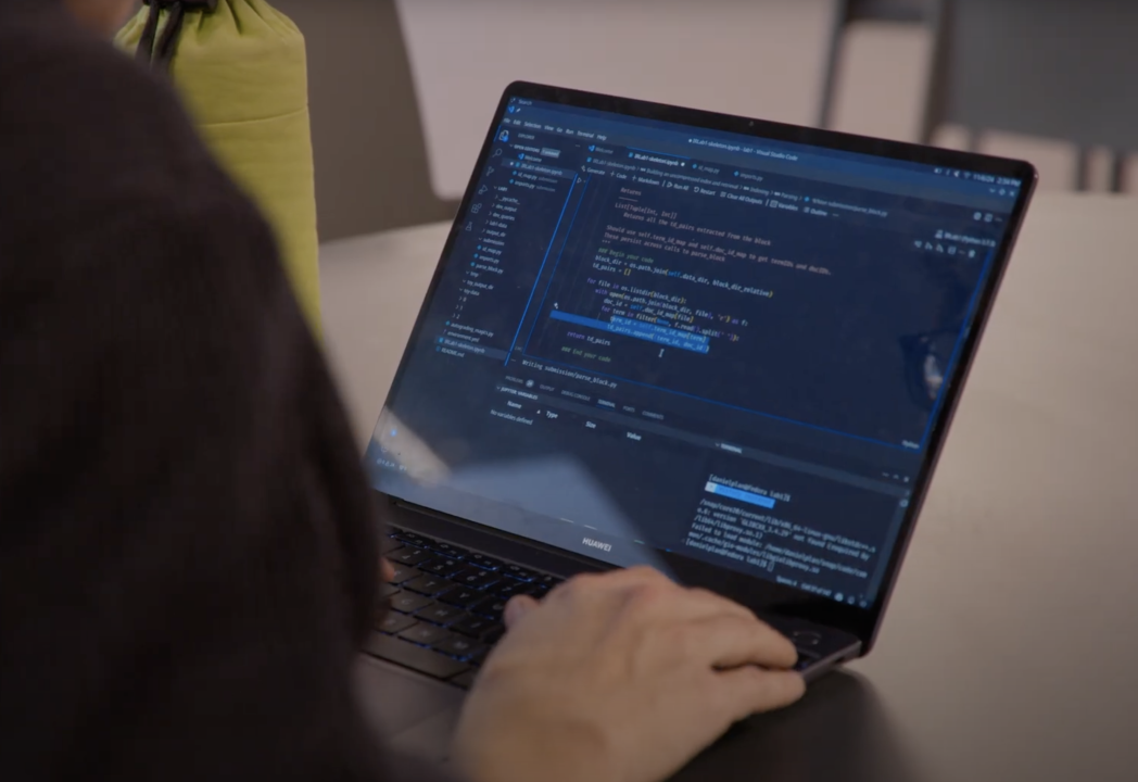 A computer with code on it.