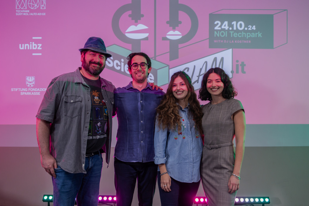 The four researcher from unibz at the Science Slam Bozen/Bolzano at NOI Techpark.